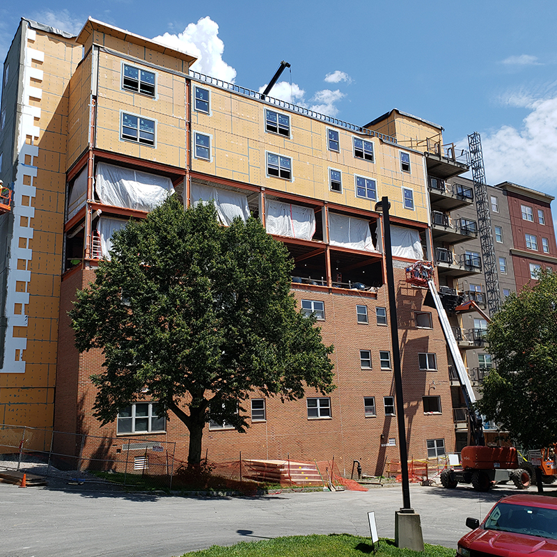 Net-zero carbon emissions apartment building under construction.